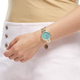 Swarovski Daytime Crystals Turquoise Dial Gold Steel Strap Watch for Women - 5182212