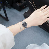 Calvin Klein Snake Black Dial Silver Steel Strap Watch For Women - K6E23141