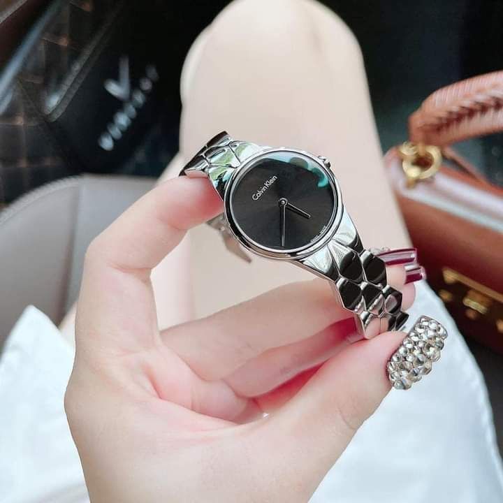 Calvin Klein Snake Black Dial Silver Steel Strap Watch For Women - K6E23141